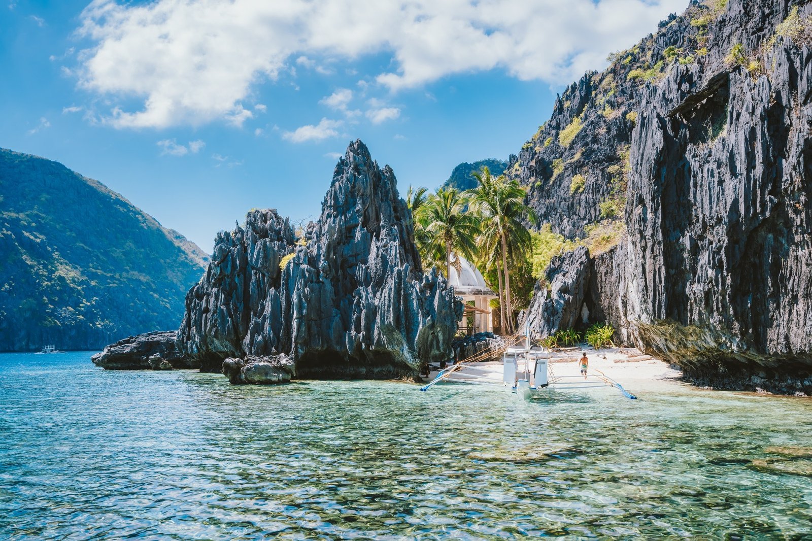 El Nido Palawan Philippines Asia. Banca boat at a small beach near the Matinloc Shrine. Trip